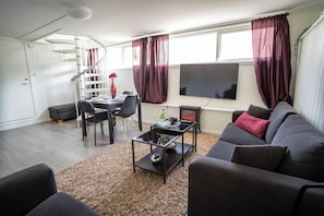 Apartment, 2 Bedrooms, Smoking | Living area | Flat-screen TV
