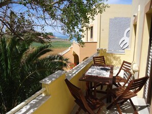 Apartment, 4 Schlafzimmer, Balkon, Poolblick | Speisen im Freien