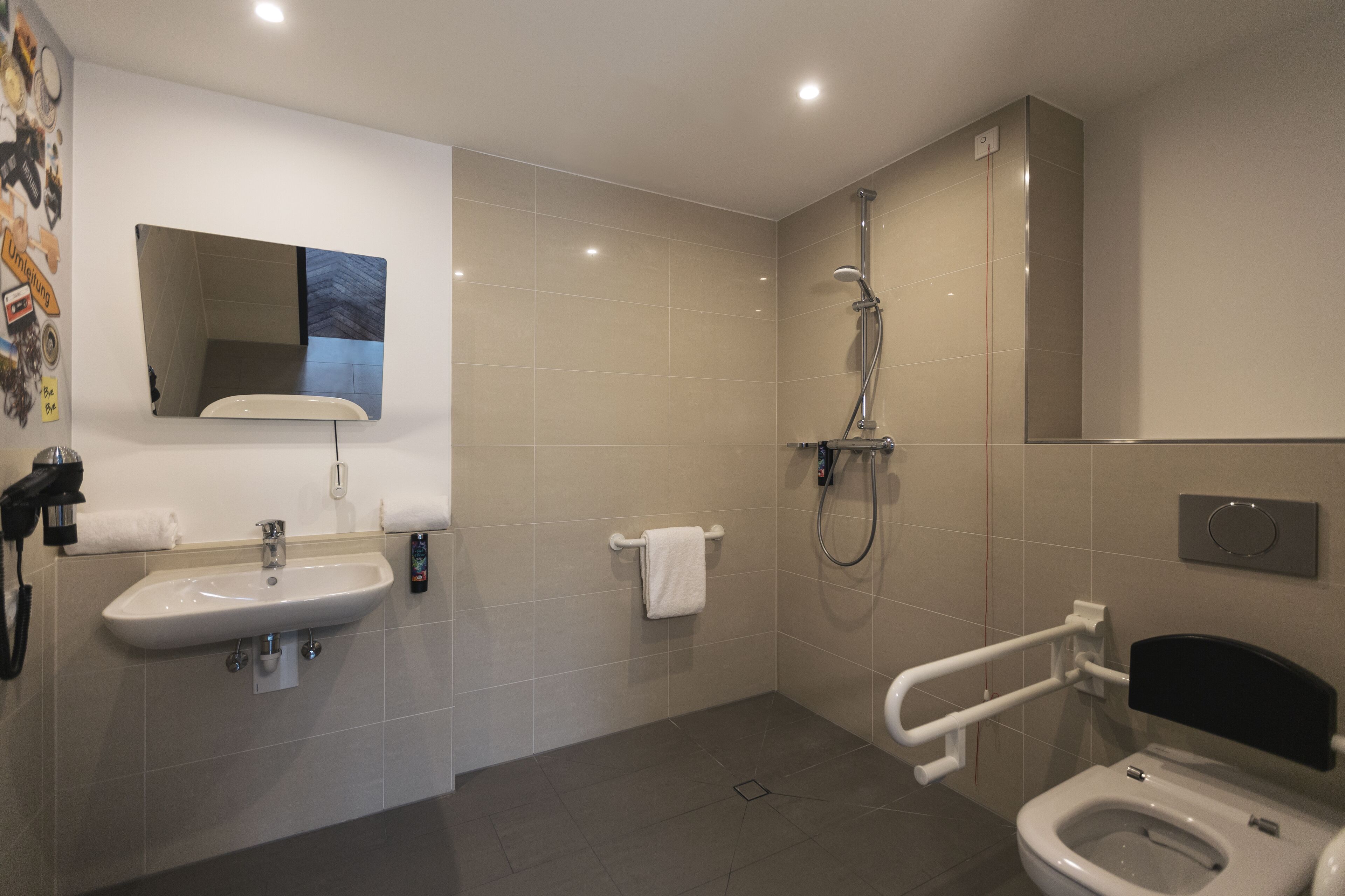 shower, free toiletries, hair dryer, towels