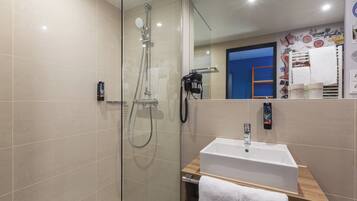 Shower, free toiletries, hair dryer, towels