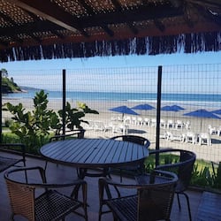 On the beach, black sand, beach bar