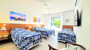 Quarto quádruplo standard | Frigobar, Wi-Fi de cortesia, roupa de cama