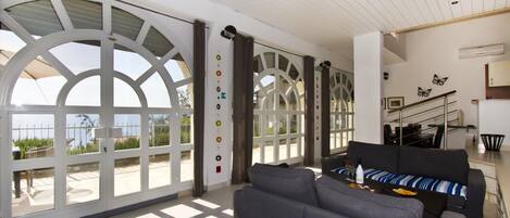 Apartment, Multiple Beds | Living room | 30-inch TV with digital channels