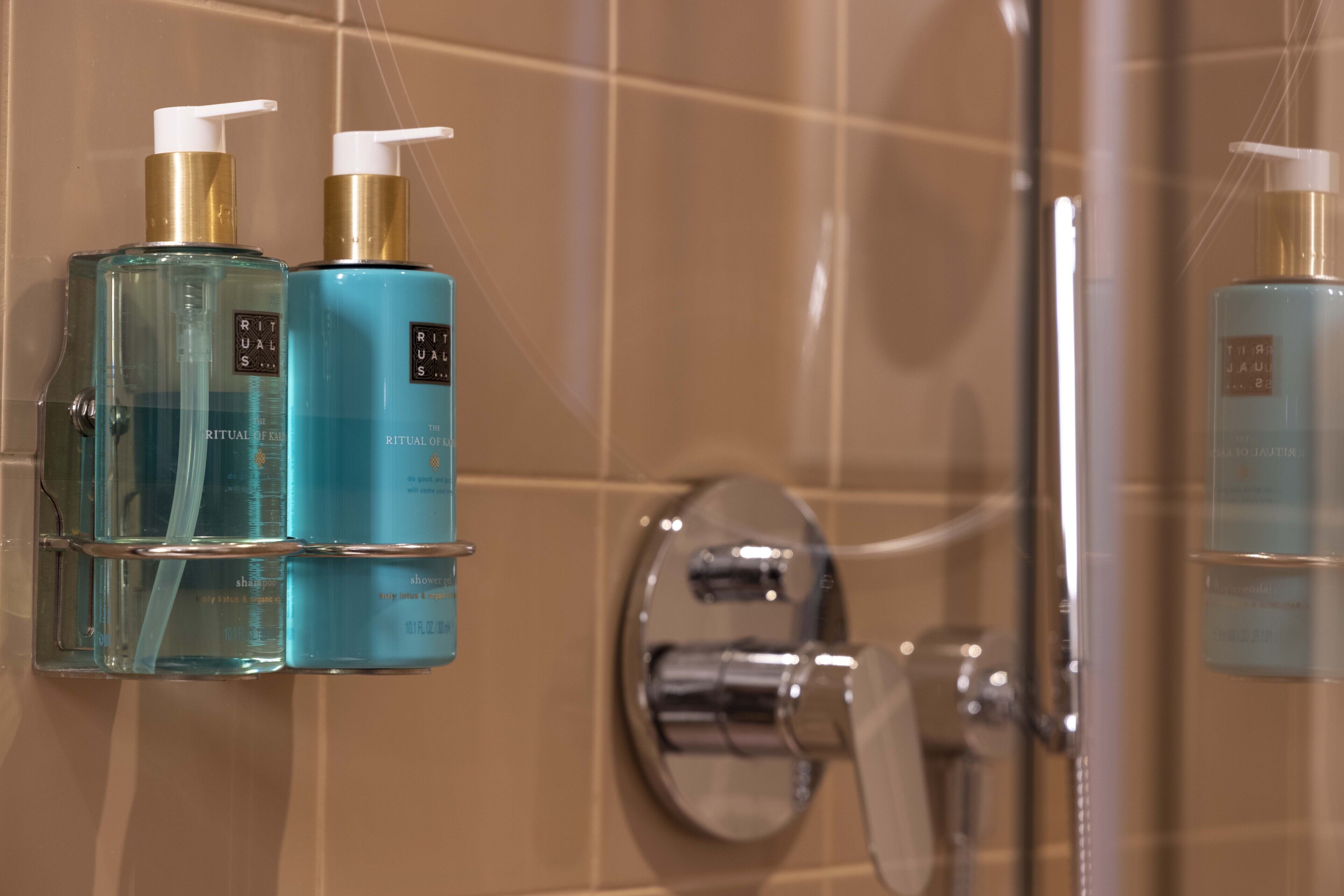 shower, designer toiletries, hair dryer, bathrobes