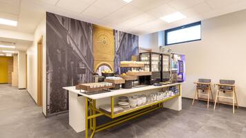 Desayuno buffet diario (EUR 9.50 por persona)