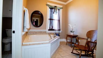 Shower, jetted tub, hair dryer, towels