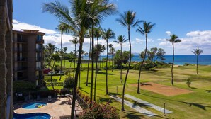 A hotel with a pool, a golf course, and a view of the ocean. - Amazing Oceanview Beachfront Getaway Close to Everything! (Kihei)