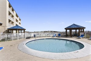 A heated pool - Sugar Beach 381 | 4 Beachfront Pools & Snack Bar | Family Fun for Every Season | Beach Getaways (Orange Beach)