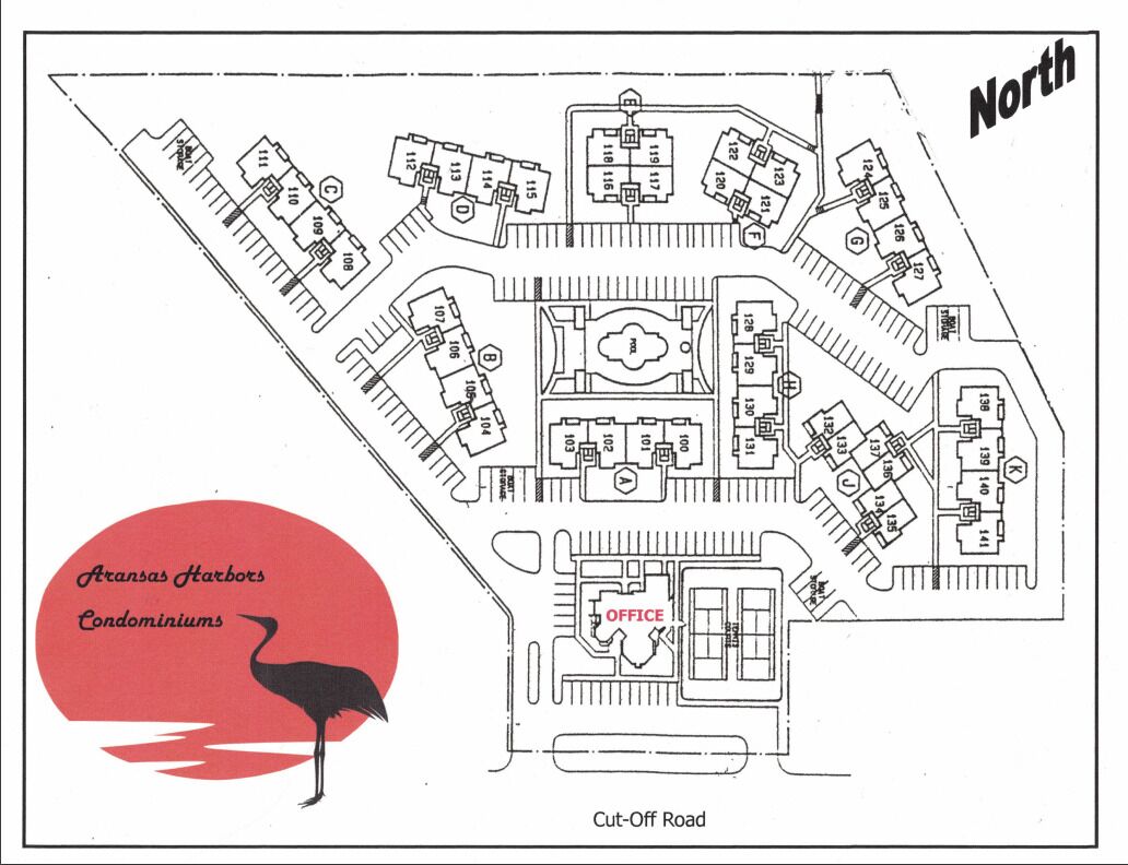 Un plan d’aménagement d’un quartier résidentiel, avec des îlots numérotés, un bâtiment abritant des bureaux au centre et une route coupée.