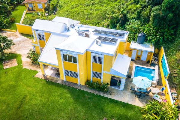 Hillside estate overlooking valley and El Yunque. 10 mins from beach and city.