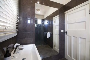 Bathtub, hair dryer, towels
