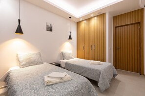 2 quartos, acesso à internet, roupa de cama