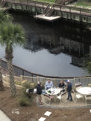 Outdoor dining - 2/2 Waterside Villas Condo 4th Floor w/ Canal Front boat docking & Gulf Views (Mexico Beach)