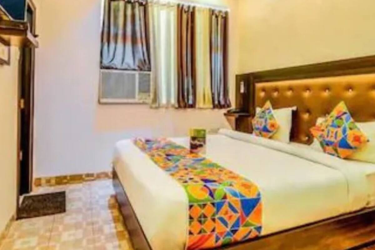 Premium bedding, down duvets, memory-foam beds, in-room safe