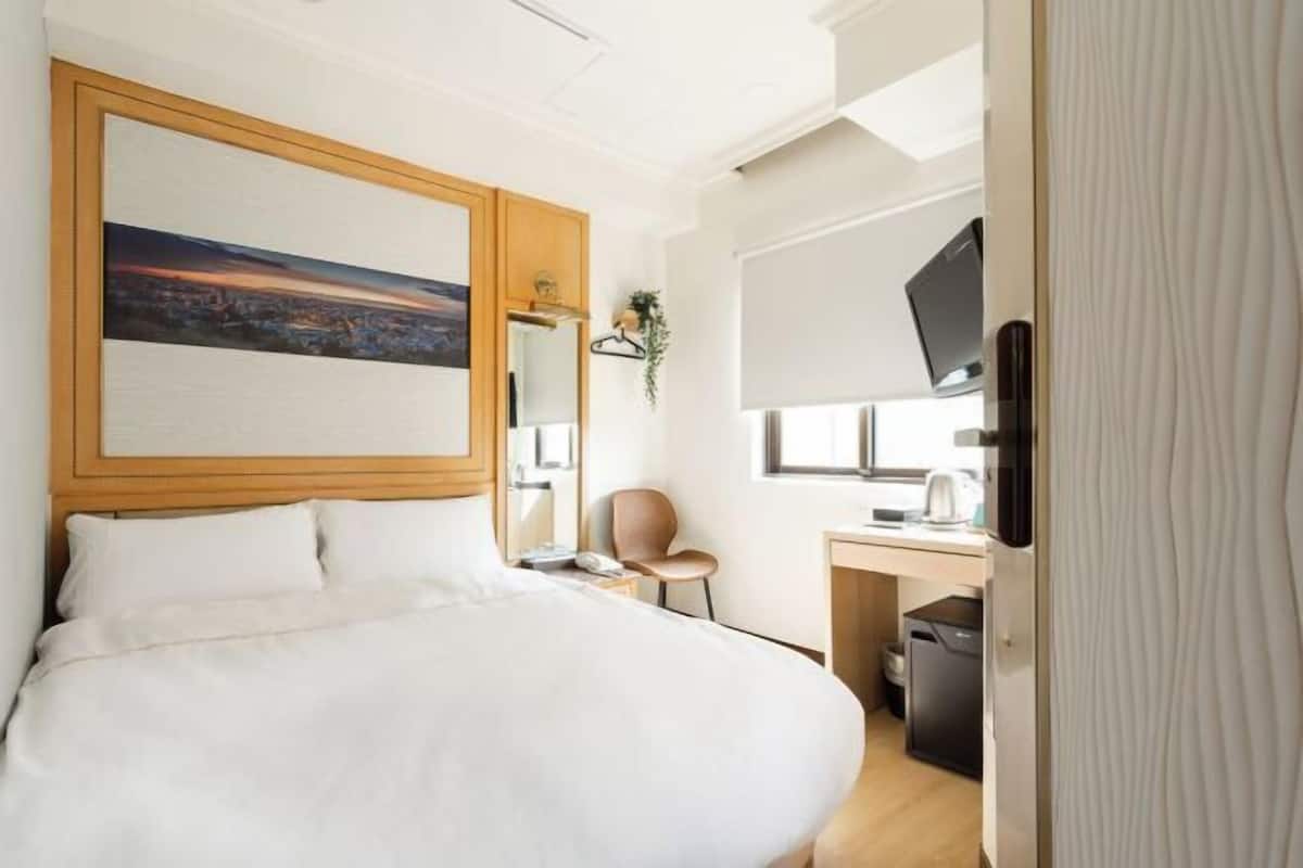 Desk, laptop workspace, blackout curtains, free WiFi