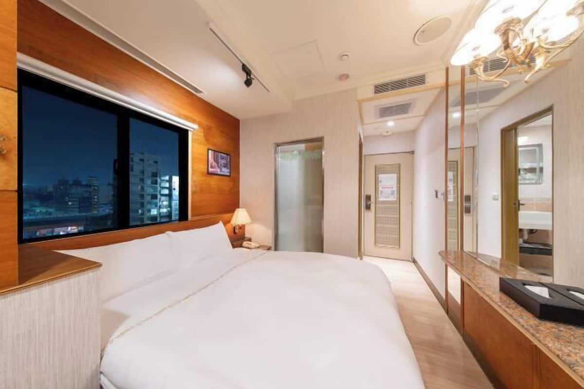 Desk, laptop workspace, blackout curtains, free WiFi