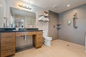 Combined shower/tub, hair dryer, towels, soap