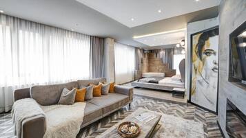Executive Suite, 1 King Bed | 1 bedroom, in-room safe, individually decorated, soundproofing