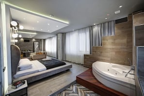 Executive-Suite, 1 King-Bett | Zimmersafe, individuell dekoriert, schallisolierte Zimmer