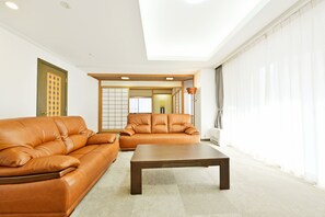 Executive Apartment | Living room | TV