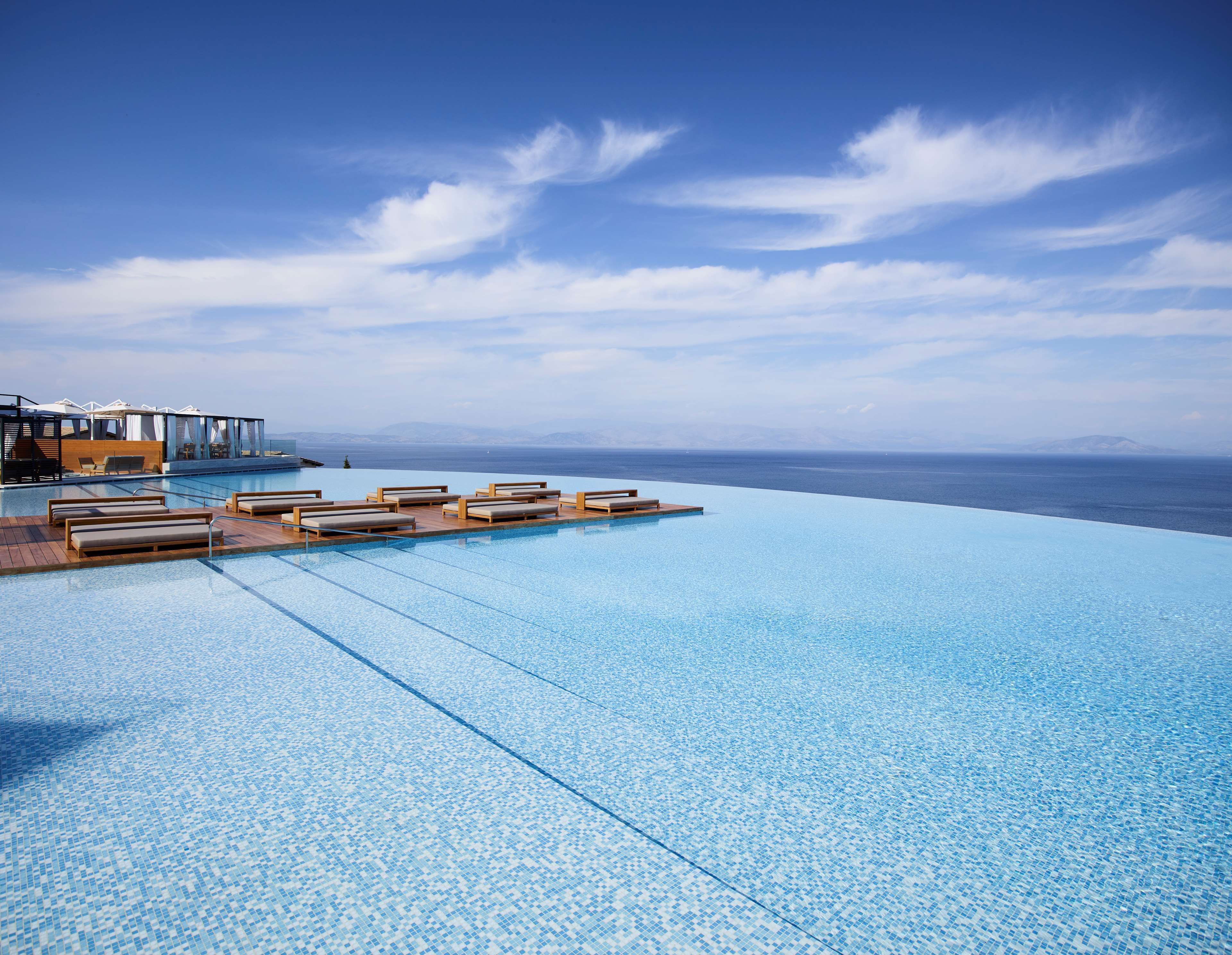 Indoor pool, seasonal outdoor pool, free pool cabanas, pool umbrellas
