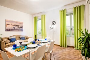 City Apartment | Living area | 21-inch flat-screen TV with satellite channels, TV - Living Times Apartment (Sorrento)