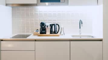 Fridge, microwave, stovetop, coffee/tea maker