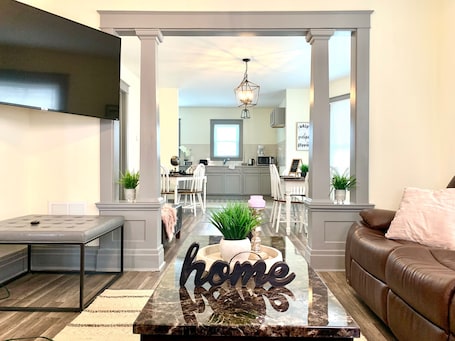 Deluxe House | Living area | 50-inch LCD TV with cable channels, TV