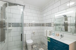 Shower, hair dryer, soap, shampoo