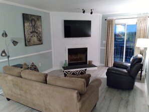 Smart TV - Oceanview Getaway  Same Song Twice! Condo 102 
Chillin' by the fire this winter! (Nags Head)