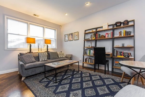 Living room with desk/library - perfect for entertaining or sitting back and enjoying a great read