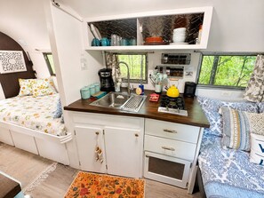 Microwave, stovetop, coffee/tea maker, toaster