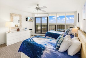 Relax in this stylish room with a large bed, flat-screen TV, and balcony overlooking the landscape.