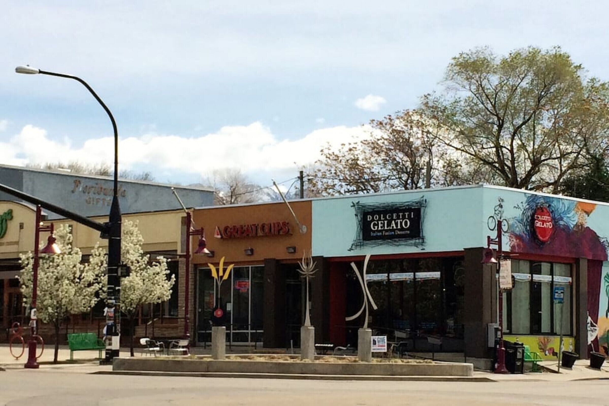 A storefront with a sign for 'Great Cups' and 'Dolce & Gelo Gelato'.