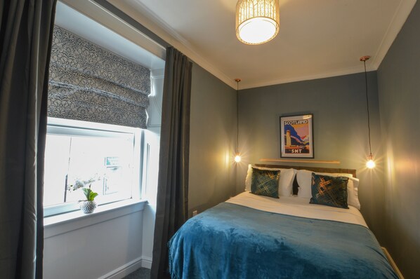 Blackout curtains, iron/ironing board, bed sheets