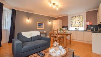 Apartment, 1 Bedroom (The Gallery) | Living room | 32-inch LCD TV with digital channels, TV
