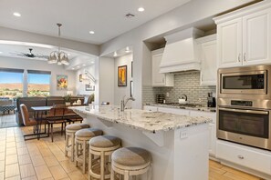 Townhome, 4 Bedrooms | Private kitchen | Fridge, oven, coffee/tea maker, toaster