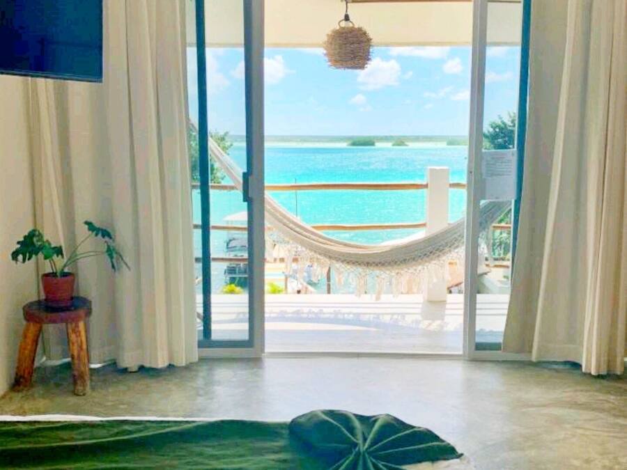 Quarto panorâmico, vista para a lagoa | Cortinas blackout, Wi-Fi de cortesia, roupa de cama