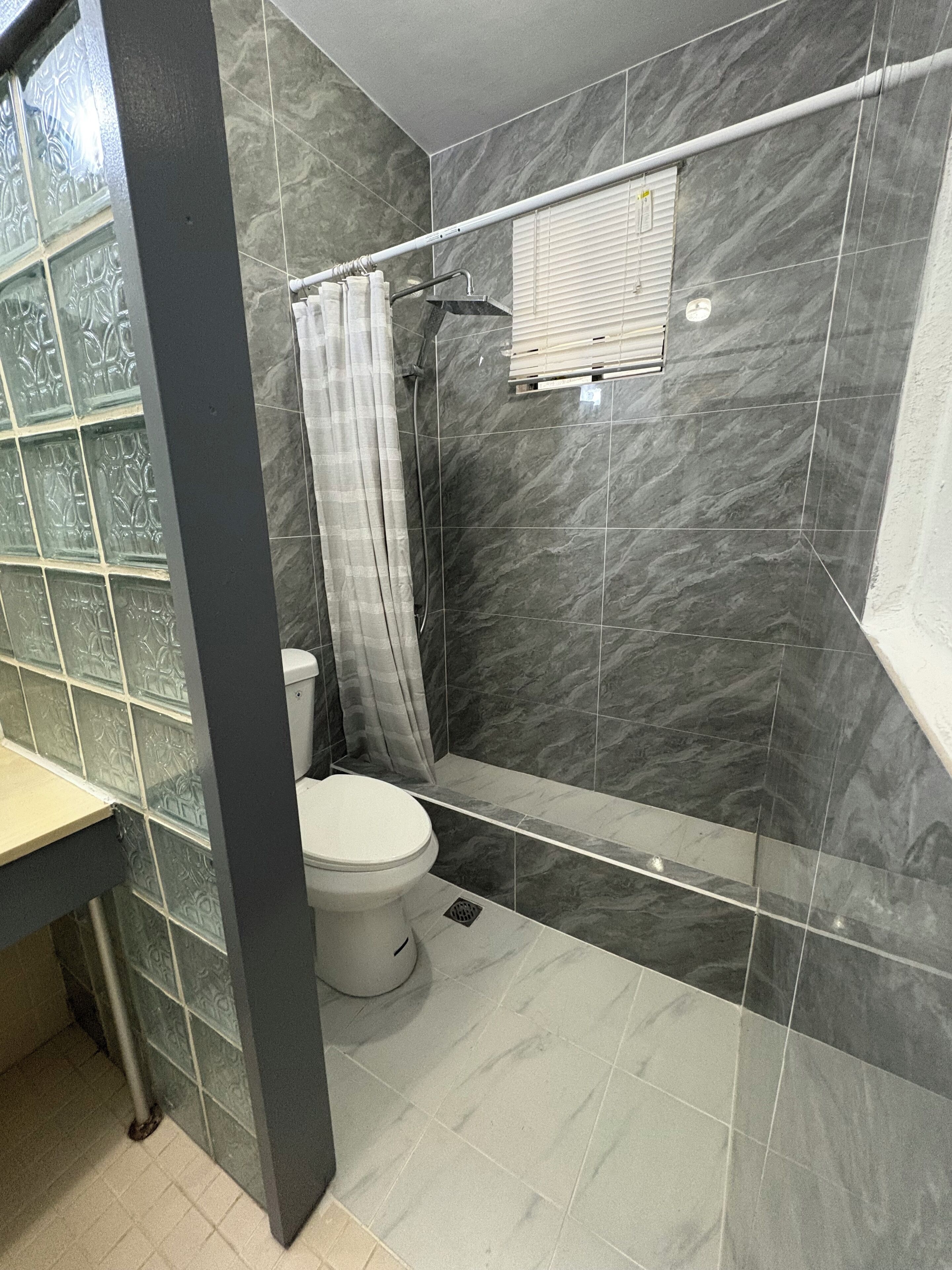 Combined shower/tub, hair dryer, towels, soap