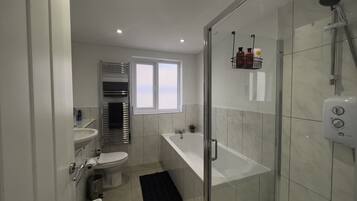 Hair dryer, towels, soap, shampoo