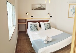 1 chambre, fer et planche à repasser, Wi-Fi gratuit, draps fournis