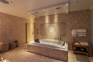 Combined shower/tub, jetted tub, hair dryer, bidet