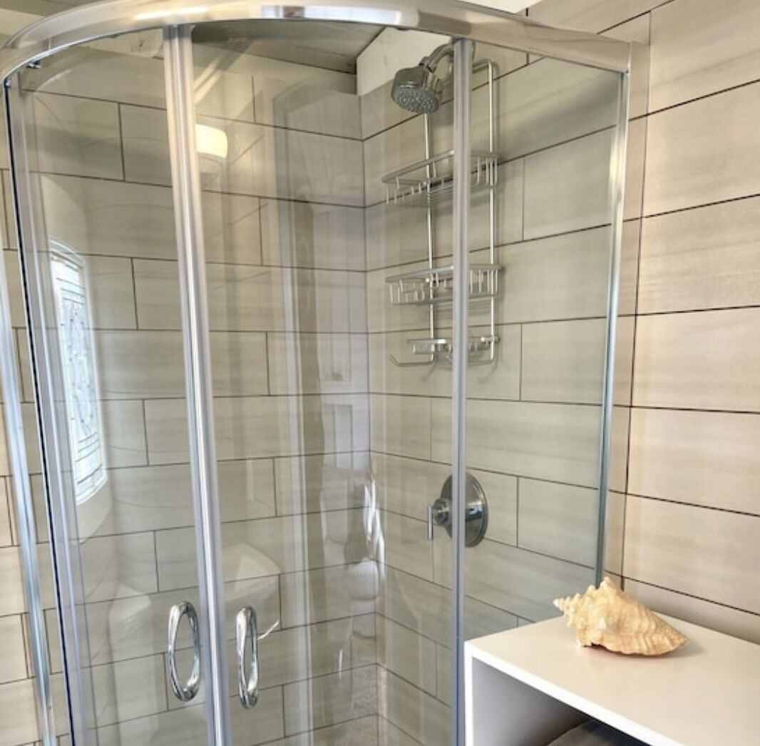 Shower, towels, soap, toilet paper