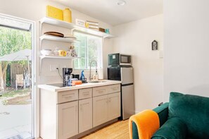 Microwave, stovetop, coffee/tea maker, toaster