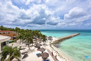 On the beach, sun-loungers, beach towels