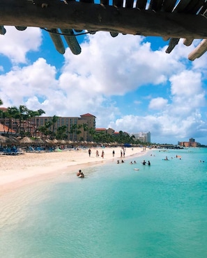 On the beach, sun-loungers, beach towels