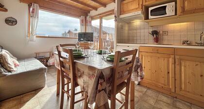 Appartement au pied des pistes avec terrasse, parking privé, casier à skis, proche commerces