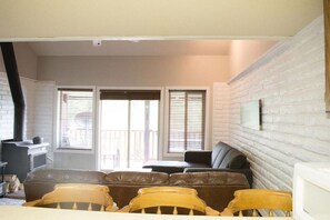 TV, fireplace, books