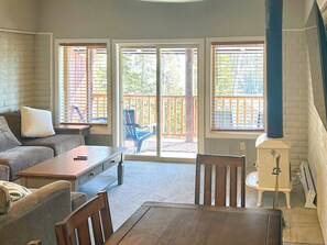 TV, fireplace, books