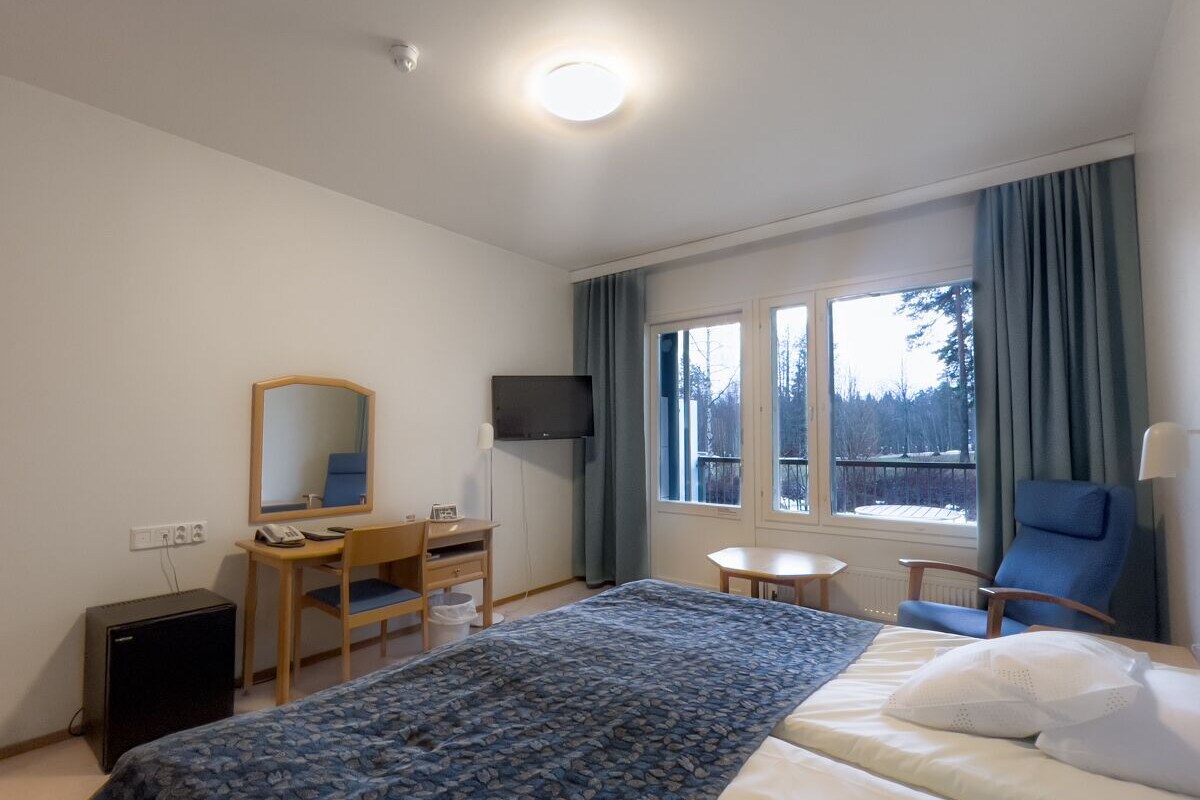 Desk, laptop workspace, blackout curtains, free WiFi